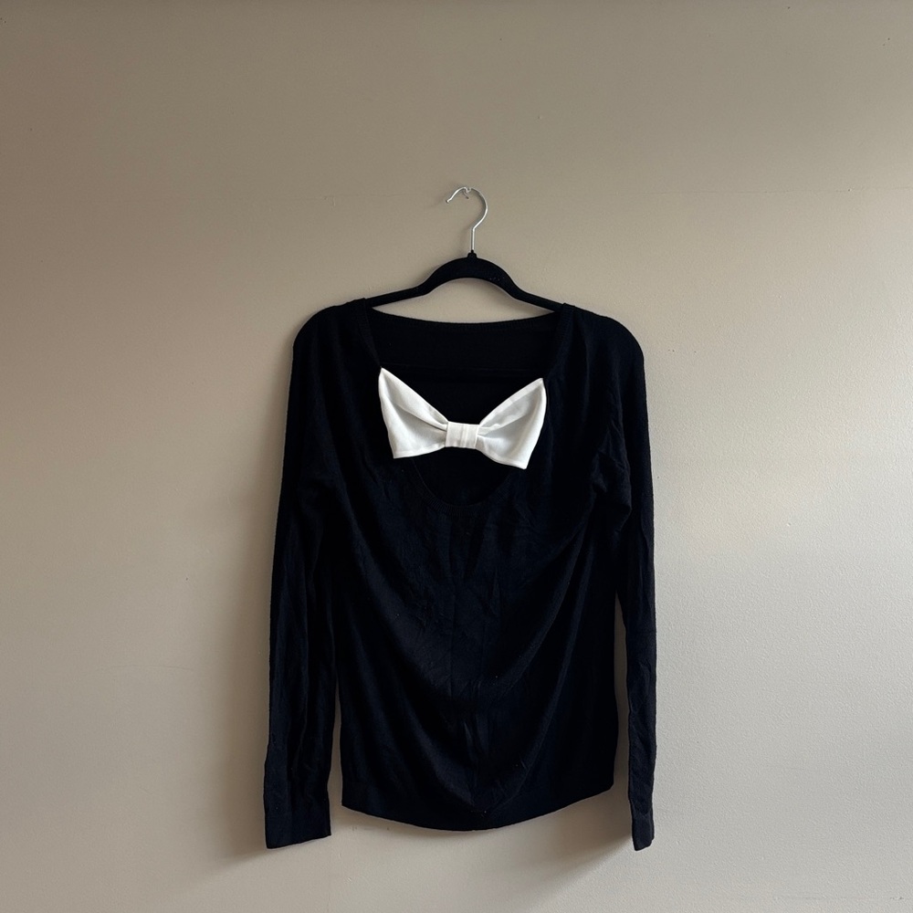 Elegant Black Blouse with White Bow